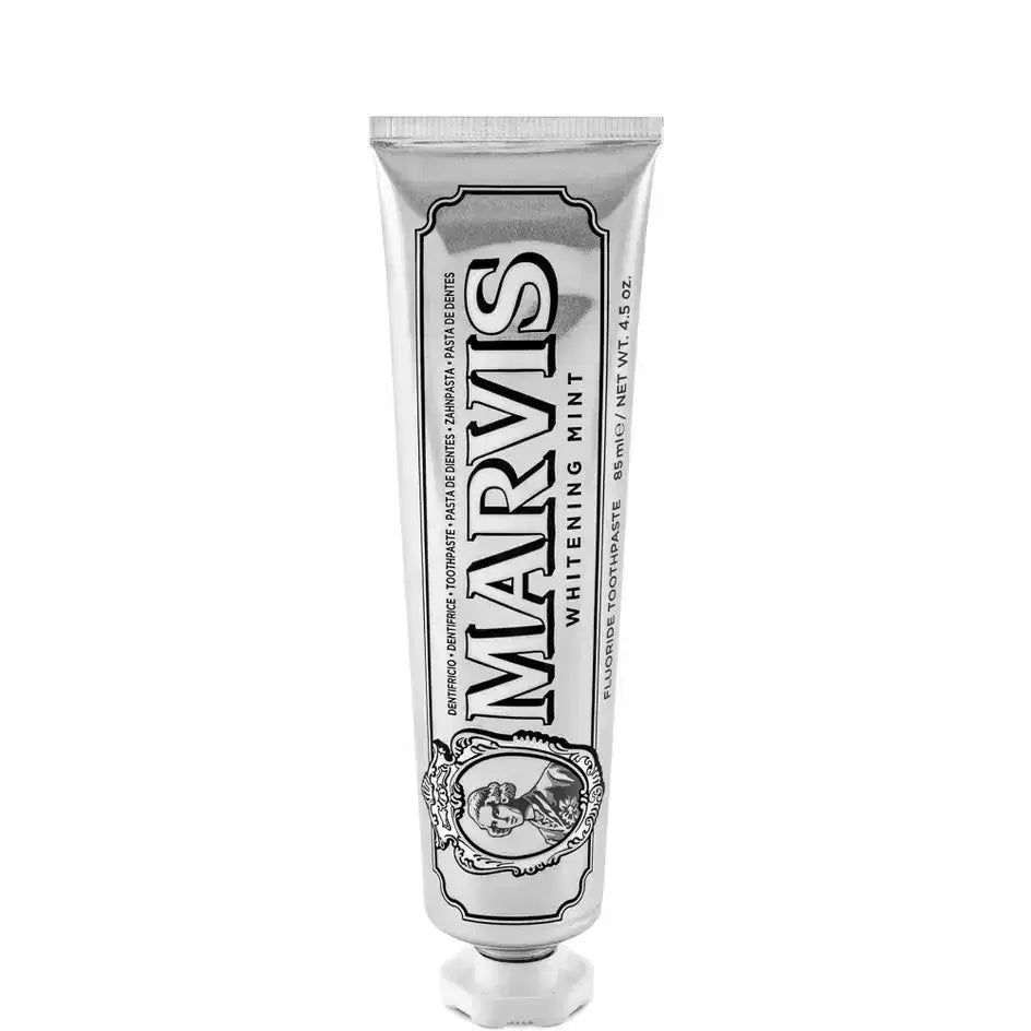 Marvis whitening mint toothpaste tube on a white background