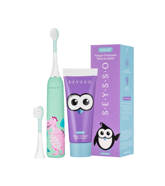 Fluoride-Free Toothpaste for Kids with a fun toothbrush and colorful packaging for safe oral care.