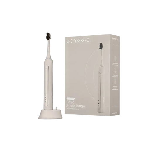 SEYSSO Color Stone Beige Basic Sonic Toothbrush beside its packaging, highlighting its modern design and color.
