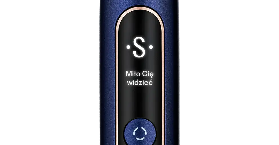 Close-up of SEYSSO Hypertech Infinity Sonic Toothbrush with LED display featuring greeting message.