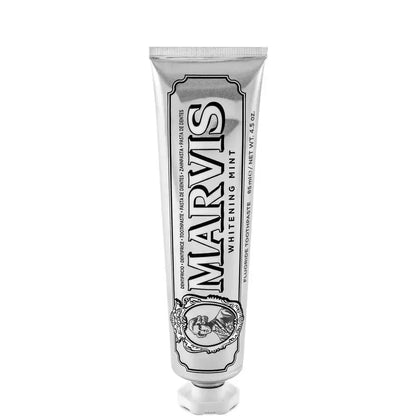 Marvis whitening mint toothpaste tube on a white background